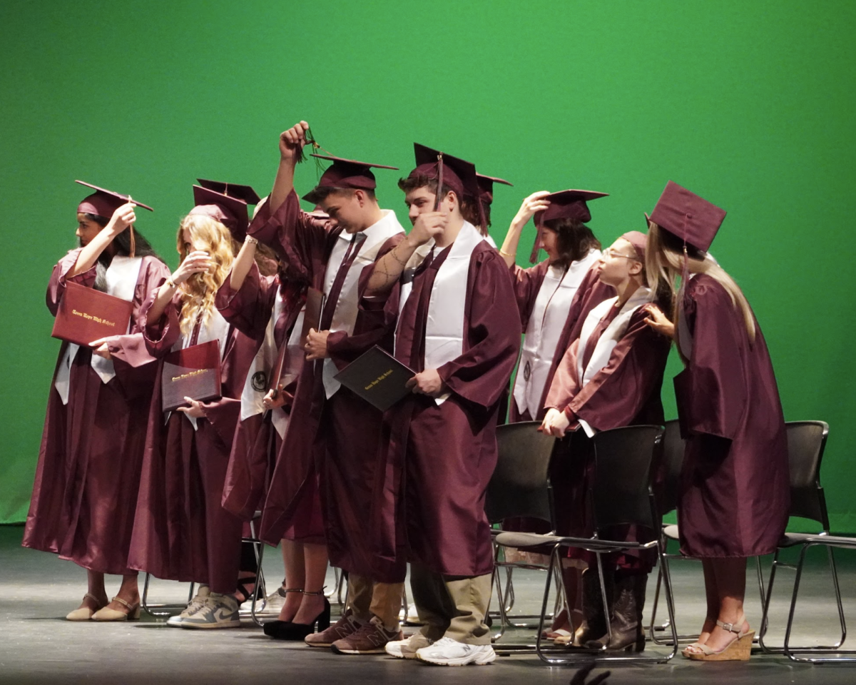 Eleven+Green+Hope+graduates+turn+their+tassels+as+they+complete+their+high+school+career.+